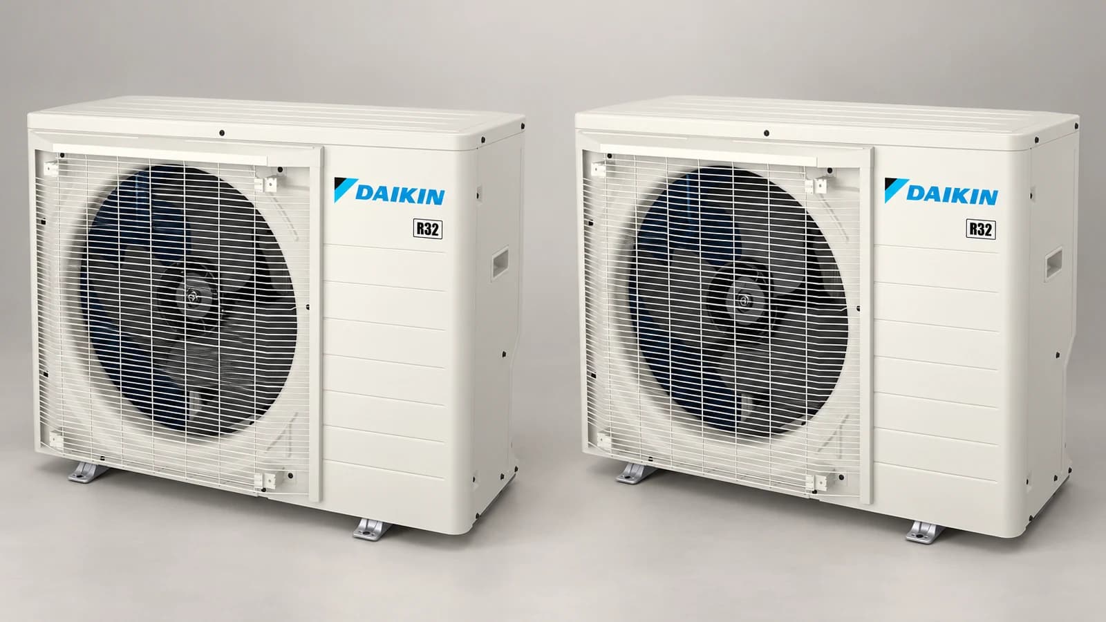 Two white Daikin-branded side-discharge outdoor air conditioners shown side by side for a DC6VS versus DC9VS comparison